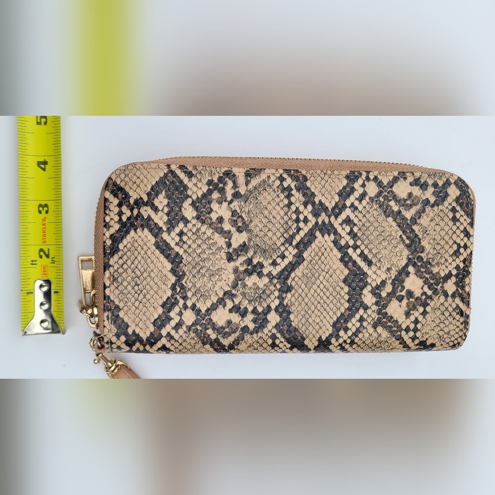 Faux snake skin double sided wallet with wrist strap.‎ a new day